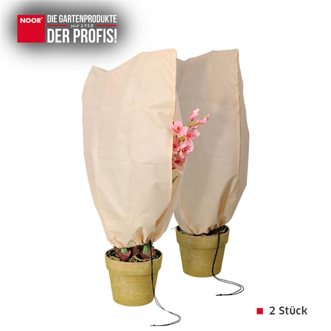 Zwei dekorative beige Winterschutz-Hauben über kleinen Kübelpflanzen auf Balkon oder Terrasse zum Schutz vor Kälte