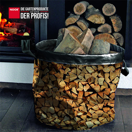 Mit Holzscheiten befüllte Kaminholztasche für den sauberen Transport von Brennholz in den Wohnraum