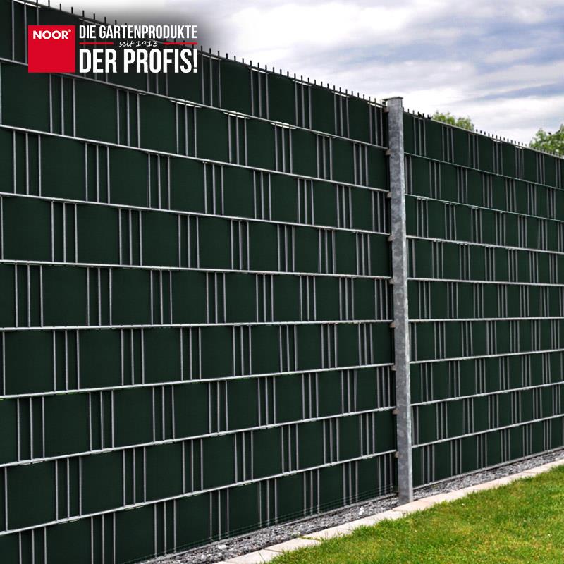 Blickdicht eingeflochtener PP Sichtschutzstreifen PRO in einem modernen Gittermattenzaun zur Grundstücksabgrenzung