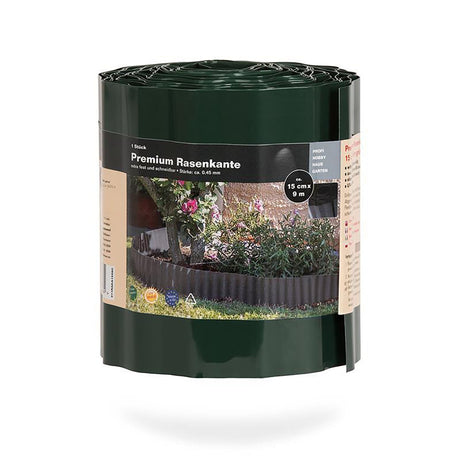 Rolle der dunkelgrünen Premium Rasenkante von NOOR aus PET mit Sinuswellung zur Beetabgrenzung.